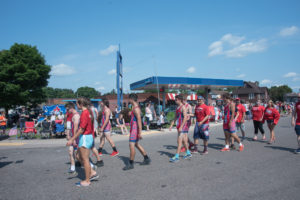 Westwood's Wrestling team was walking in the parade.
