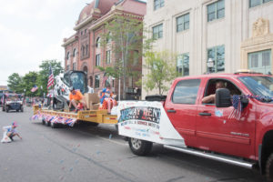 Midway Rentals tossing out the candy.