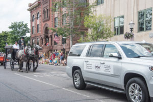 Canale Tonella Funeral Home with their beautiful dapple gray draft horses.