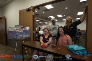 Paul, Nancy, Amy, and Luke at the welcome table.