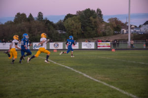 Number 17 dashes away from the opponents.