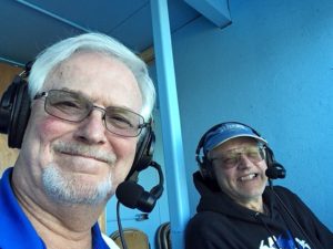 Mike and Bob get ready to watch a great game.