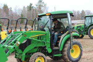 Adam had to take a spin in the tractor